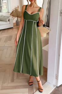 Woman wearing Contrast Binding Linen Blend Maxi Dress-Contrast Binding Linen Blend Maxi Dress - Effortlessly Chic and breezy. Your go-to choice for sunny days, contrast binding that adds a stylish edge.