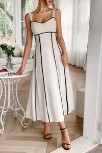 Woman wearing Contrast Binding Linen Blend Maxi Dress-Contrast Binding Linen Blend Maxi Dress - Effortlessly Chic and breezy. Your go-to choice for sunny days, contrast binding that adds a stylish edge.