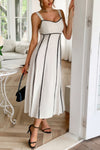 Woman wearing Contrast Binding Linen Blend Maxi Dress-Contrast Binding Linen Blend Maxi Dress - Effortlessly Chic and breezy. Your go-to choice for sunny days, contrast binding that adds a stylish edge.