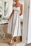 Woman wearing Contrast Binding Linen Blend Maxi Dress-Contrast Binding Linen Blend Maxi Dress - Effortlessly Chic and breezy. Your go-to choice for sunny days, contrast binding that adds a stylish edge.