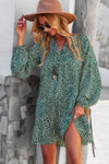 Woman wearing Polka Dot Tunic Dress-Bring playful charm to your wardrobe with this Polka Dot Tunic Dress. Designed for comfort and effortless style. Crafted from breathable, lightweight fabric.