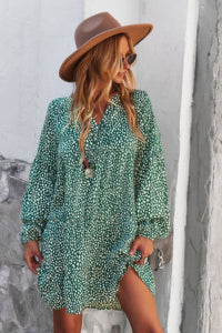 Woman wearing Polka Dot Tunic Dress-Bring playful charm to your wardrobe with this Polka Dot Tunic Dress. Designed for comfort and effortless style. Crafted from breathable, lightweight fabric.