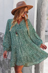 Woman wearing Polka Dot Tunic Dress-Bring playful charm to your wardrobe with this Polka Dot Tunic Dress. Designed for comfort and effortless style. Crafted from breathable, lightweight fabric.