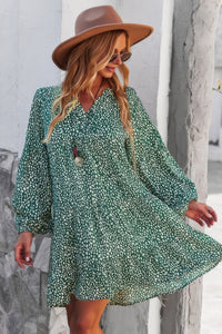 Woman wearing Polka Dot Tunic Dress-Bring playful charm to your wardrobe with this Polka Dot Tunic Dress. Designed for comfort and effortless style. Crafted from breathable, lightweight fabric.