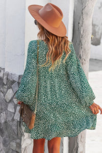 Woman wearing Polka Dot Tunic Dress-Bring playful charm to your wardrobe with this Polka Dot Tunic Dress. Designed for comfort and effortless style. Crafted from breathable, lightweight fabric.