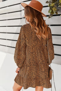 Woman wearing Polka Dot Tunic Dress-Bring playful charm to your wardrobe with this Polka Dot Tunic Dress. Designed for comfort and effortless style. Crafted from breathable, lightweight fabric.