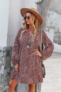 Woman wearing Polka Dot Tunic Dress-Bring playful charm to your wardrobe with this Polka Dot Tunic Dress. Designed for comfort and effortless style. Crafted from breathable, lightweight fabric.