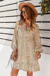 Woman wearing Polka Dot Tunic Dress-Bring playful charm to your wardrobe with this Polka Dot Tunic Dress. Designed for comfort and effortless style. Crafted from breathable, lightweight fabric.