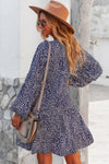 Woman wearing Polka Dot Tunic Dress-Bring playful charm to your wardrobe with this Polka Dot Tunic Dress. Designed for comfort and effortless style. Crafted from breathable, lightweight fabric.