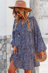 Woman wearing Polka Dot Tunic Dress-Bring playful charm to your wardrobe with this Polka Dot Tunic Dress. Designed for comfort and effortless style. Crafted from breathable, lightweight fabric.