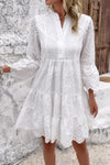 Woman wearing Button Flared Sleeve Hollow Out Lace Dress-Step into timeless elegance with this V-Neck Button Flared Sleeves Hollow Out Lace Dress, perfect for special occasions or everyday sophistication.