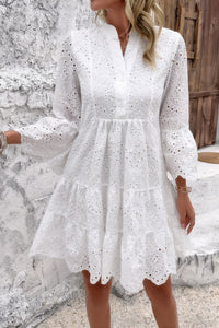 Woman wearing Button Flared Sleeve Hollow Out Lace Dress-Step into timeless elegance with this V-Neck Button Flared Sleeves Hollow Out Lace Dress, perfect for special occasions or everyday sophistication.