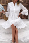 Woman wearing Button Flared Sleeve Hollow Out Lace Dress-Step into timeless elegance with this V-Neck Button Flared Sleeves Hollow Out Lace Dress, perfect for special occasions or everyday sophistication.