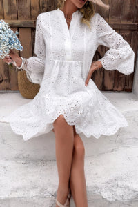 Woman wearing Button Flared Sleeve Hollow Out Lace Dress-Step into timeless elegance with this V-Neck Button Flared Sleeves Hollow Out Lace Dress, perfect for special occasions or everyday sophistication.