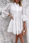 Woman wearing Button Flared Sleeve Hollow Out Lace Dress-Step into timeless elegance with this V-Neck Button Flared Sleeves Hollow Out Lace Dress, perfect for special occasions or everyday sophistication.
