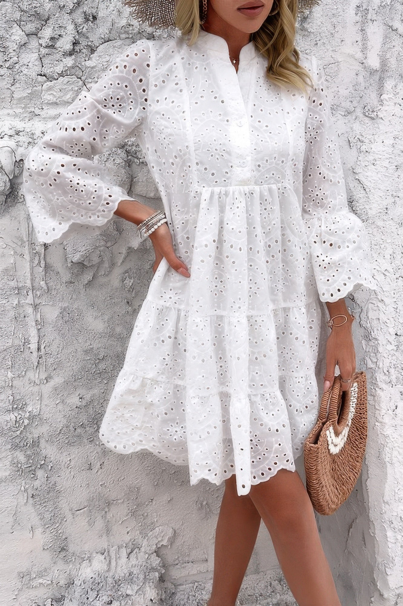 Woman wearing Button Flared Sleeve Hollow Out Lace Dress-Step into timeless elegance with this V-Neck Button Flared Sleeves Hollow Out Lace Dress, perfect for special occasions or everyday sophistication.