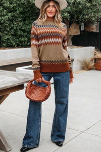 Cozy up in the Eva Aztec Crew Neck Sweater. Western-inspired print, soft knit, and versatile layering boho-chic sweater