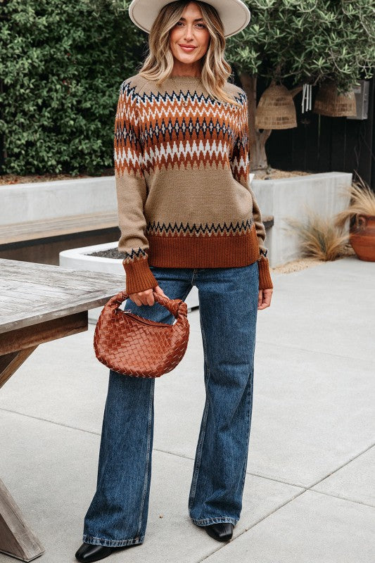 Cozy up in the Eva Aztec Crew Neck Sweater. Western-inspired print, soft knit, and versatile layering boho-chic sweater