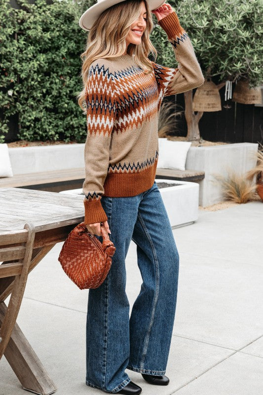 Cozy up in the Eva Aztec Crew Neck Sweater. Western-inspired print, soft knit, and versatile layering boho-chic sweater