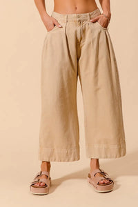 Shop Wide Leg Chino Pants With Pockets-Effortlessly Stylish Wide-Leg Cropped Chino Pants, flattering mid-rise fit and a relaxed wide leg silhouette. Designed with pleated details and side pockets.-available at Reef Love online boho-chic boutique