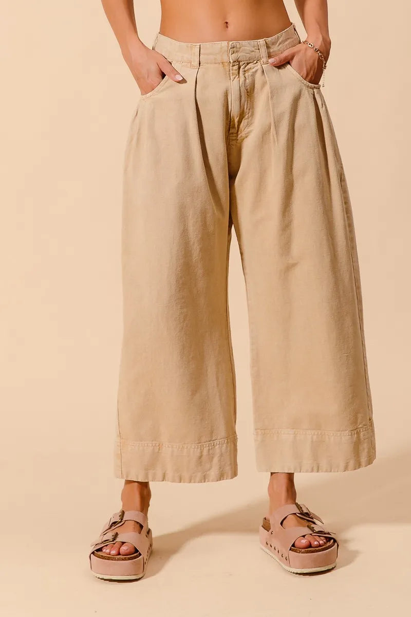 Shop Wide Leg Chino Pants With Pockets-Effortlessly Stylish Wide-Leg Cropped Chino Pants, flattering mid-rise fit and a relaxed wide leg silhouette. Designed with pleated details and side pockets.-available at Reef Love online boho-chic boutique