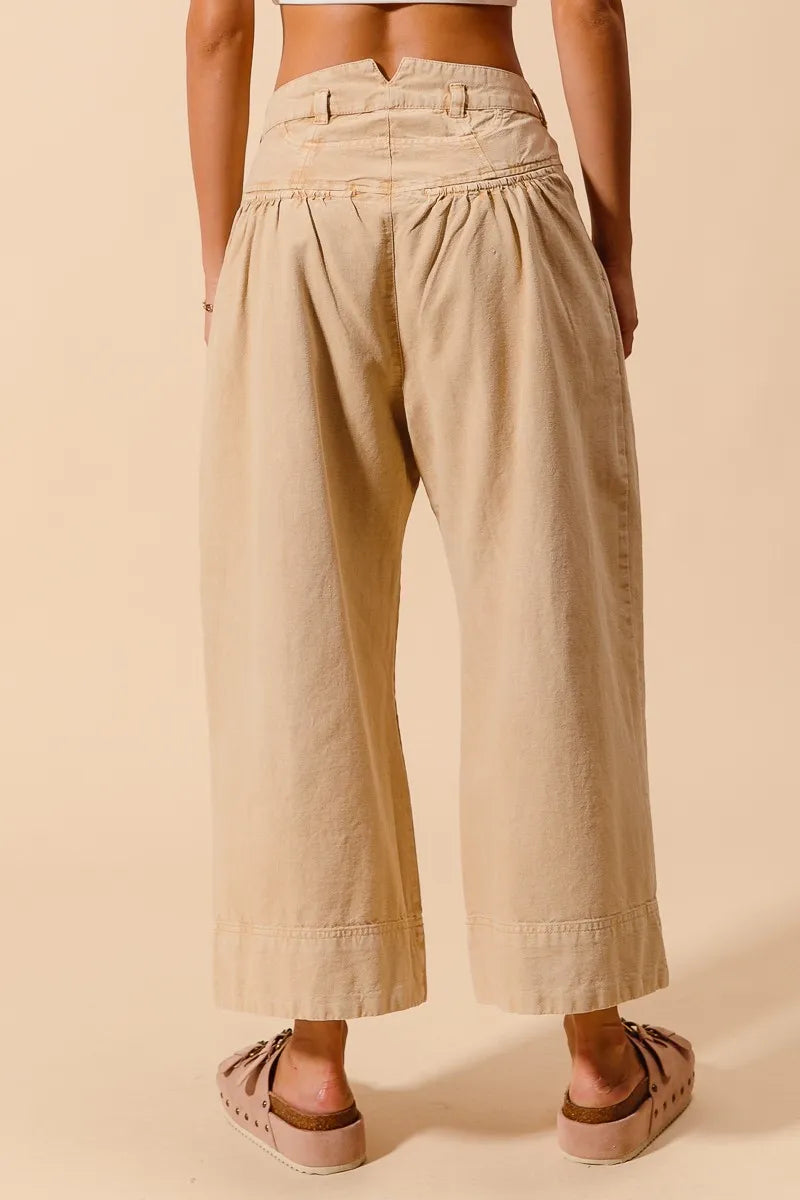 Shop Wide Leg Chino Pants With Pockets-Effortlessly Stylish Wide-Leg Cropped Chino Pants, flattering mid-rise fit and a relaxed wide leg silhouette. Designed with pleated details and side pockets.-available at Reef Love online boho-chic boutique