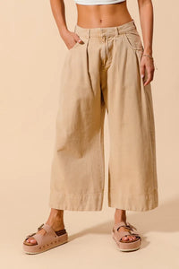 Shop Wide Leg Chino Pants With Pockets-Effortlessly Stylish Wide-Leg Cropped Chino Pants, flattering mid-rise fit and a relaxed wide leg silhouette. Designed with pleated details and side pockets.-available at Reef Love online boho-chic boutique