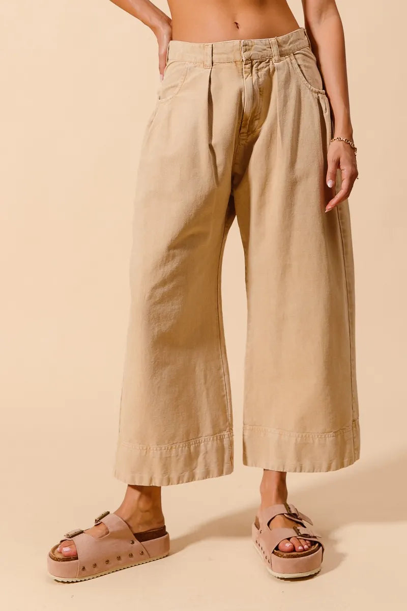 Shop Wide Leg Chino Pants With Pockets-Effortlessly Stylish Wide-Leg Cropped Chino Pants, flattering mid-rise fit and a relaxed wide leg silhouette. Designed with pleated details and side pockets.-available at Reef Love online boho-chic boutique