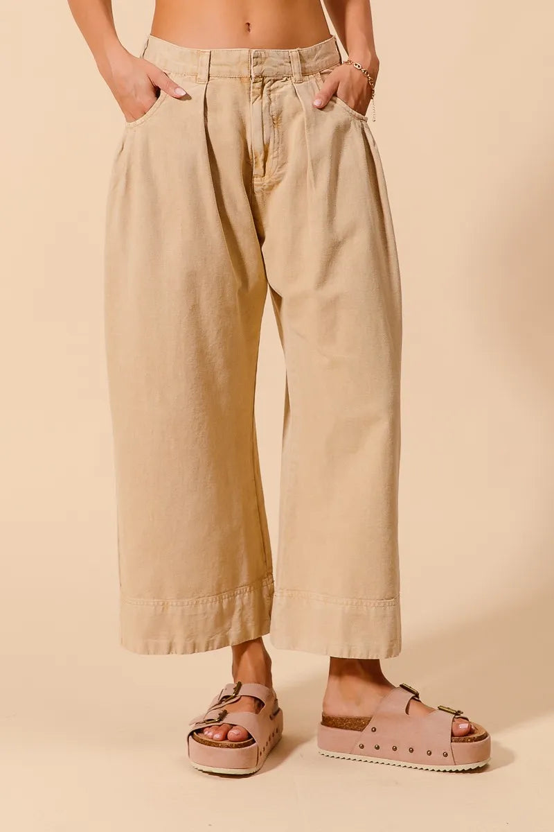 Shop Wide Leg Chino Pants With Pockets-Effortlessly Stylish Wide-Leg Cropped Chino Pants, flattering mid-rise fit and a relaxed wide leg silhouette. Designed with pleated details and side pockets.-available at Reef Love online boho-chic boutique