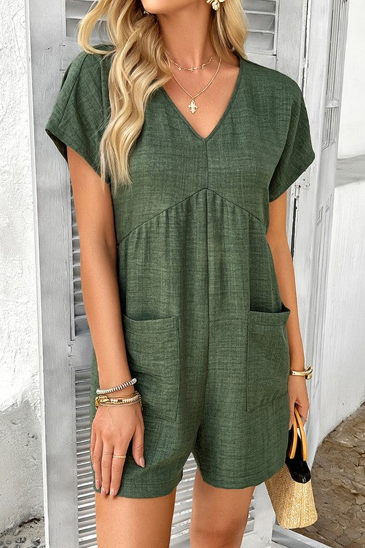 Shop Willow Back Strap Drape Romper-Relaxed green romper with a deep V-neck, scoop back with strap detail, and pockets. Lightweight and breezy—perfect for beach, vacation, or casual days.-available at Reef Love online boho-chic boutique