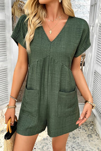 Shop Willow Back Strap Drape Romper-Relaxed green romper with a deep V-neck, scoop back with strap detail, and pockets. Lightweight and breezy—perfect for beach, vacation, or casual days.-available at Reef Love online boho-chic boutique