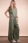 Women's Olive Green woven top and pants set is a versatile and chic outfit option that offers a coordinated and put-together look.