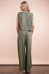 Women's Olive Green woven top and pants set is a versatile and chic outfit option that offers a coordinated and put-together look.