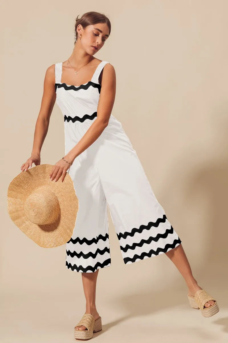 Shop Scallop Ric Rac Trimmed Wide Leg Jumpsuit-Scallop Ric Rac Trimmed Wide Leg Jumpsuit - Effortless Style, designed to impress with its distinctive scallop ric rac trim that adds a playful yet refined touch. -Reef Love Boho-Chic Boutique