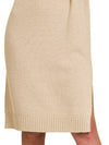 Woman wearing Turtle Neck Long Sleeve Midi Sweater Dress, Beige-Turtle Neck Long Sleeve Midi Sweater Dress in beige, a cozy and chic addition to your fall or winter wardrobe. Perfect for casual and dressier occasions. 
