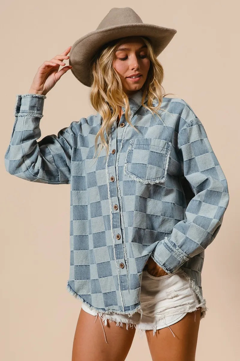 Woman wearing Frayed Edged Detail Washed Checker Denim Shirt-Oversized checkered denim shirt with frayed edges and vintage wash. 100% cotton, no stretch, perfect for laid-back layering with a stylish twist.