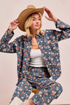 Shop Washed Floral Print Denim Shacket-This Washed Floral Print Denim Shacket features a relaxed oversized fit, button front, and vintage floral wash. Pair with wide leg jeans to complete the look.-Reef Love Boho-Chic Boutique