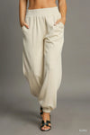 Drawstring Jogger Pants with Front Seam Detail-Women's Drawstring Jogger Pants with Front Seam Detail – Perfect mix of Comfort with a Modern Style. Made from a soft, stretchy fabric blend.-Reef Love Boutique
