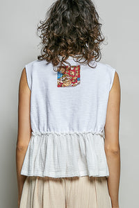 POL Floral Patch Ruffled Sleeveless Top in white with raw edge detail and bohemian-inspired silhouette.