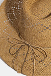 Woman wearing Turquoise & Shell Star Beads Strap Western Straw Hat-Western-style straw hat with turquoise and shell star beads. Lightweight, boho-chic, and perfect for festivals, beach days, or sunny adventures.