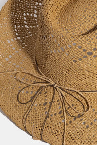 Woman wearing Turquoise & Shell Star Beads Strap Western Straw Hat-Western-style straw hat with turquoise and shell star beads. Lightweight, boho-chic, and perfect for festivals, beach days, or sunny adventures.