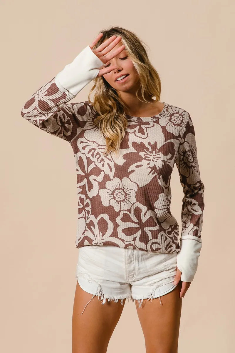 Shop Flower Printed Waffle Thumb Opening Top-Cozy and casual, flower printed waffle knit top features thumb openings, a classic crew neck, and a relaxed fit. Ideal for layering during transitional seasons.-Reef Love Boho-Chic Boutique