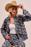 Shop Washed Floral Print Denim Shacket-This Washed Floral Print Denim Shacket features a relaxed oversized fit, button front, and vintage floral wash. Pair with wide leg jeans to complete the look.-Reef Love Boho-Chic Boutique