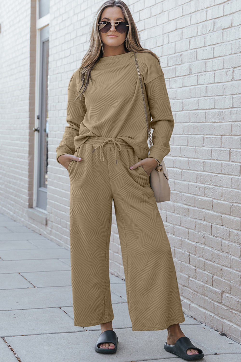 Textured long sleeve top and pants set is perfect for lounging around the house, travel, or a casual day out. Available in many colors and extended sizes.