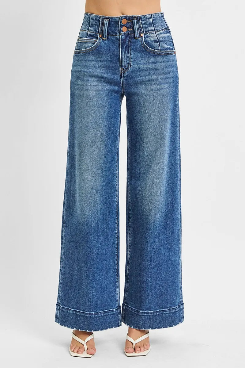Woman wearing High Rise Wide Ankle Seam Detailed Jeans-Flattering high-rise ankle jeans with bold wide seams & raw hems. Available in standard & plus sizes. Slight stretch for comfort and everyday style.