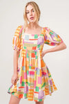 Square Neck Puff Sleeve Geo Printed Mini Dress-The square neck puff sleeve geo printed mini dress is a fashionable and eye-catching choice for a stylish ensemble. The square neckline adds a modern and chic touch-Reef Love Boho-Chic Boutique