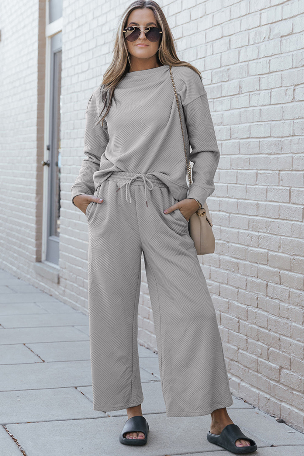 Textured long sleeve top and pants set is perfect for lounging around the house, travel, or a casual day out. Available in many colors and extended sizes.