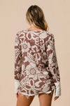 Shop Flower Printed Waffle Thumb Opening Top-Cozy and casual, flower printed waffle knit top features thumb openings, a classic crew neck, and a relaxed fit. Ideal for layering during transitional seasons.-Reef Love Boho-Chic Boutique