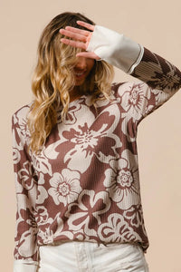 Shop Flower Printed Waffle Thumb Opening Top-Cozy and casual, flower printed waffle knit top features thumb openings, a classic crew neck, and a relaxed fit. Ideal for layering during transitional seasons.-Reef Love Boho-Chic Boutique