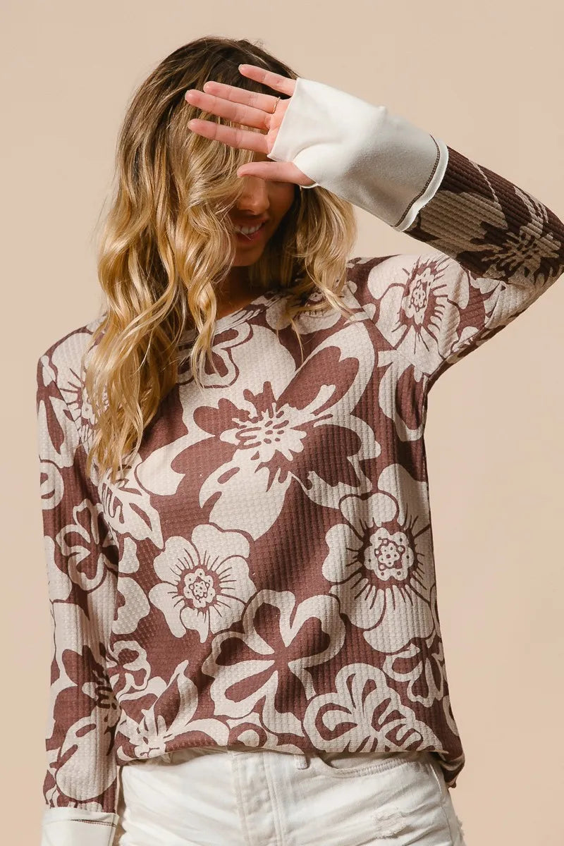 Shop Flower Printed Waffle Thumb Opening Top-Cozy and casual, flower printed waffle knit top features thumb openings, a classic crew neck, and a relaxed fit. Ideal for layering during transitional seasons.-Reef Love Boho-Chic Boutique